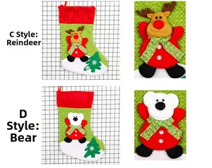 Detailed close-up of corduroy Christmas stockings with reindeer and bear doll accents