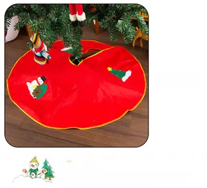 Detail of red 90cm Christmas tree skirt with snowman and festive tree appliques