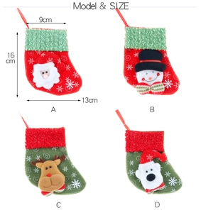 Detail of Christmas stocking gift bags with snowflake patterns and 3D cartoon characters
