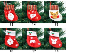 Dettaglio di 6 mini calze natalizie con motivi 3D Babbo Natale, Pupazzo e Renna