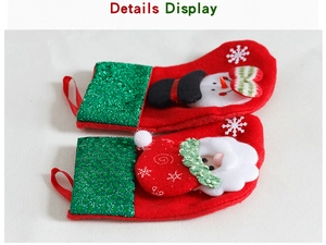 Detail view of red Christmas stocking gift bags with sequin cuffs and 3D applique designs
