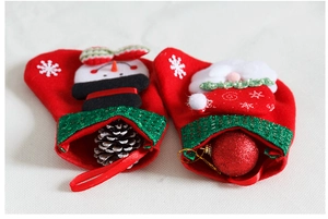 Detail of mini Christmas stockings with sequins, 3D Santa and Snowman appliques