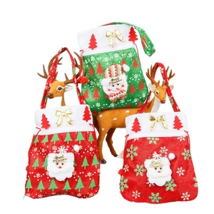 Christmas gift bags with 3D Santa and Snowman figures, festive red and green burlap pouches