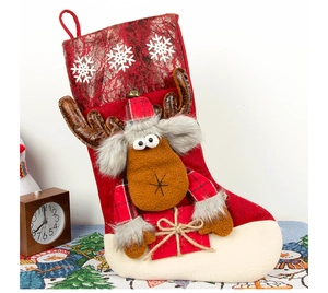 Detailed view of red Christmas stocking featuring 3D reindeer with snowflake patterns