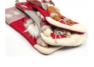 Detail showing 3D Santa and reindeer motifs on large red and white Christmas stockings