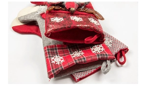 Detail of red and grey Christmas stockings with snowflake prints and bell ornaments