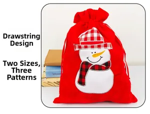 Detail of red velvet Christmas drawstring bag with embroidered snowman and dual closure cords