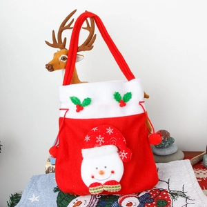 Christmas red velvet gift bag with 3D snowman applique and festive holly leaf handle