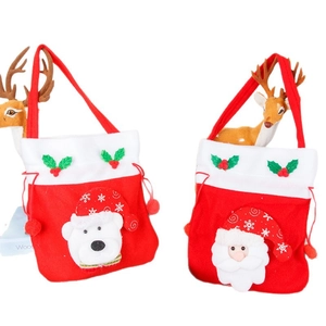Red Christmas velvet gift bags featuring plush Santa and Polar Bear with drawstring closure