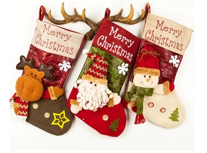 Close-up of 3D Christmas stockings with reindeer, Santa, and snowman embroidery details