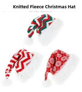 Detailed view of three knitted Christmas hats with plush trim and varied festive patterns