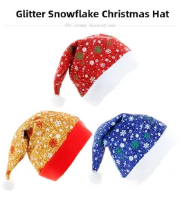 Set di 3 cappelli natalizi in tessuto spazzolato rosso oro e blu con motivi a fiocchi di neve