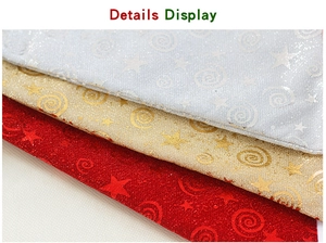 Macro detail of mesh Christmas hats showing glitter star patterns in red, gold and silver