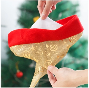 Detail of mesh Christmas hat with gold glitter stars and soft red plush trim texture