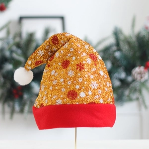 Cappello di Natale dorato con paillettes, fiocchi di neve e bordo in feltro rosso per feste