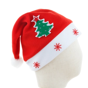 Classic red plush Santa hat with green felt Christmas tree and snowflake brim