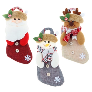 Three-piece Christmas stockings set with Santa, Snowman, and Reindeer cartoon designs