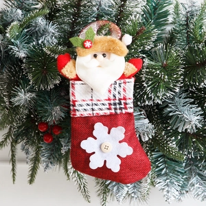 Mini burlap Christmas stocking with Santa Claus doll and snowflake for festive tree decor