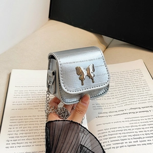 Mini bolso silla plateado con detalle de lazo y correa de cadena para mujer