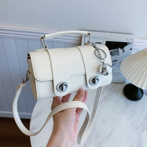 Chic cream white faux-crocodile pattern crossbody bag with metal lock and silver charm