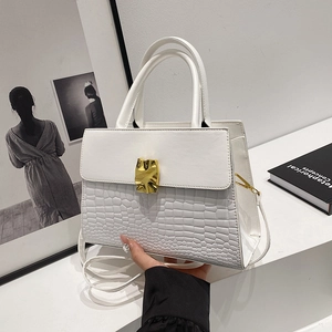White faux leather handbag with crocodile pattern and stylish gold irregular metal clasp