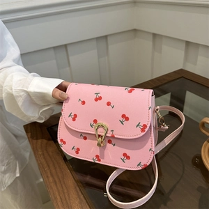 Pink crossbody square bag with cherry print and golden arch clasp for women