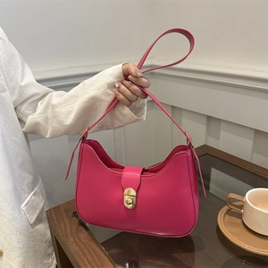 Fashionable rose pink crescent shoulder bag with gold metal buckle for women