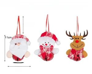 Detailed view of three Christmas plush ornaments featuring snowman and elk with metal bells