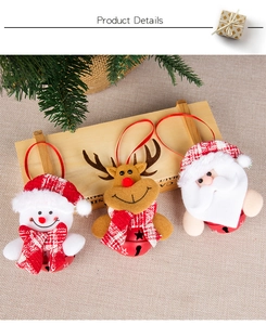 Detailed view of Christmas plush ornaments featuring Santa, snowman, reindeer with bells