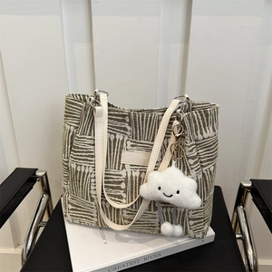 Retro striped canvas tote bag in cream and green with plush cloud charm detail