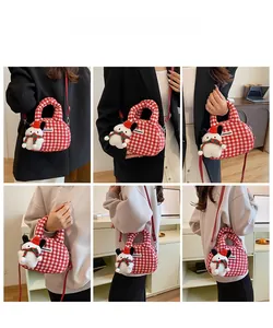 Detail of red and white plaid bowling bag with cute puppy plush charm and long strap