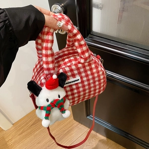 Red and white checkered quilted bowling bag with a cute plush Christmas doll charm