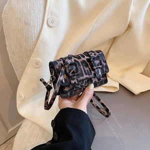 Stylish mini leopard print crossbody bag with buckle detail for trendy women fashion