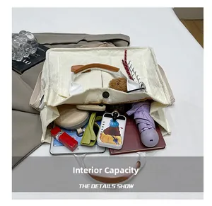 Interior view of corduroy tote bag showing large capacity for tablet and daily items