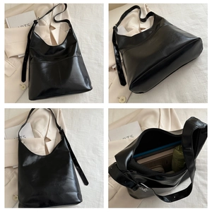 Detailed views of a black PU leather tote bag featuring a back pocket and zip closure