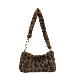 Plush leopard print shoulder bag with amber acrylic chain for winter fashion