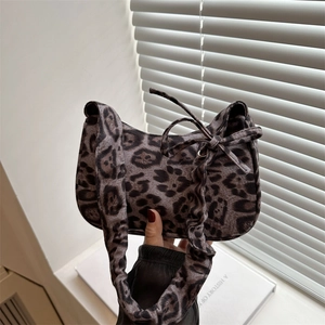 Retro leopard print underarm bag for women with velvet texture and side bow accent