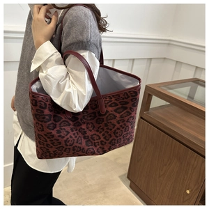 Large leopard print tote bag with rich texture and spacious interior for daily use