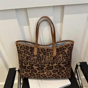 Chic large leopard print tote bag with brown leather handles for autumn fashion
