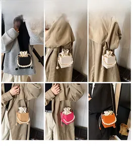 Collage of pearl handle bucket bags in five colors with drawstring and chain straps