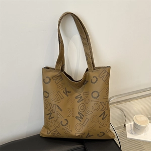 Minimalist camel tote bag with letter prints and wide handles for daily commute