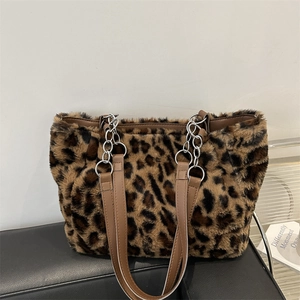 Sac cabas chic en fausse fourrure léopard avec lanières en cuir et chaînes argentées