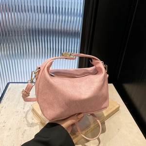 Chic pink strawberry print hobo bag in matte texture with shoulder strap and metal hardware