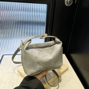 Minimalist grey strawberry print shoulder bag with chic silver buckle and adjustable strap