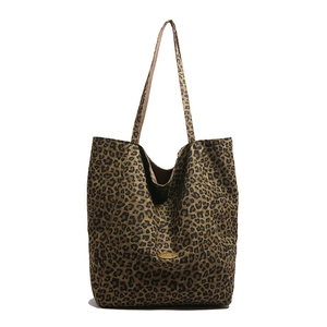 Large leopard print tote bag with gold metal plaque and long shoulder straps for women