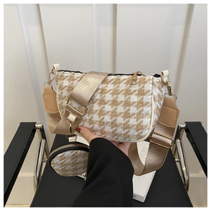 Detail of houndstooth crossbody bag set with detachable mini round coin purse and wide strap