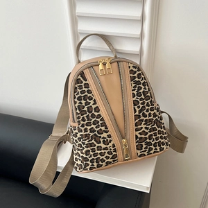 Chic leopard print and beige leather mini backpack with golden triple zipper accents