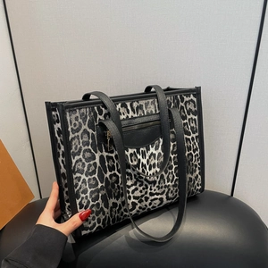 Chic leopard print tote bag with black leather trim for women's daily commute
