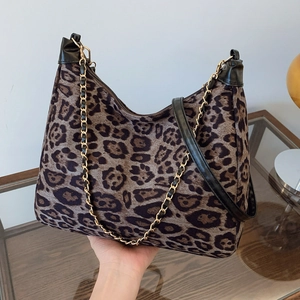 Fashionable leopard print hobo bag with gold chain and black leather strap for women