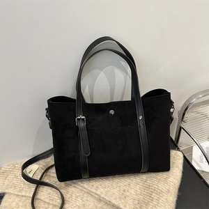 Matte suede black tote bag with leather strap and magnetic closure for daily commute